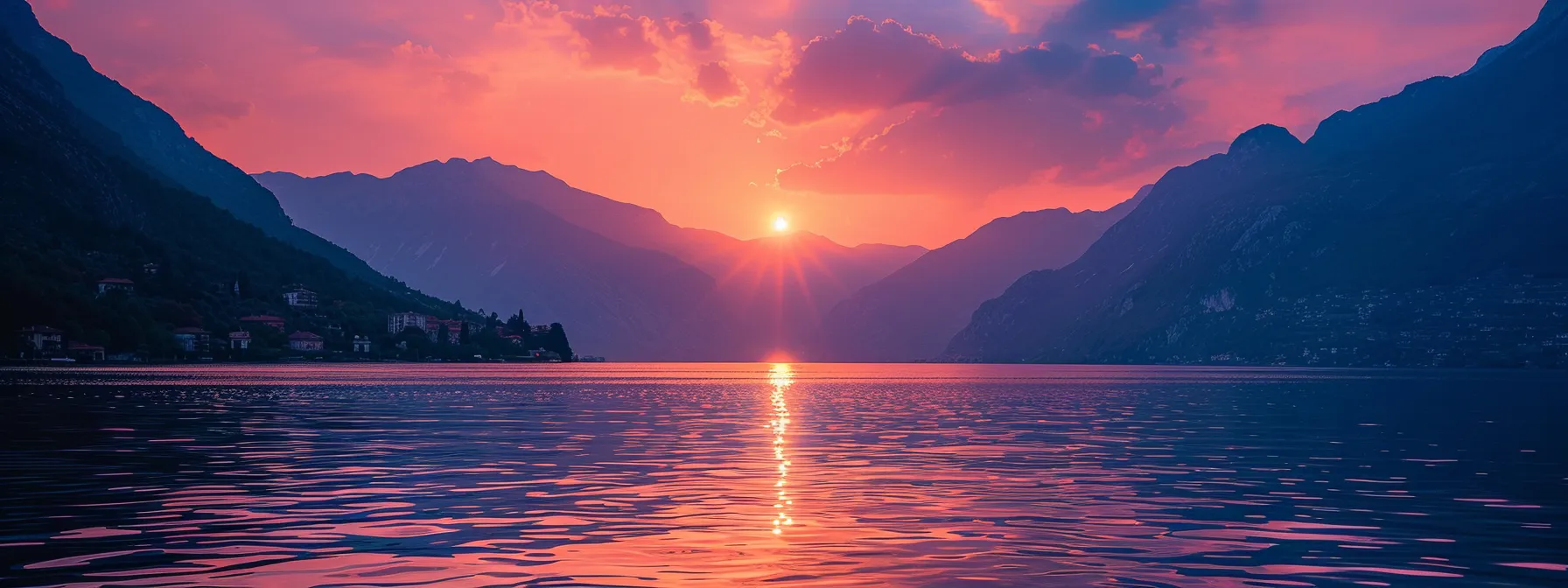 a breathtaking sunset casts vibrant hues of orange and purple over a serene lake, with silhouetted mountains framing the horizon and soft ripples reflecting the colorful sky.