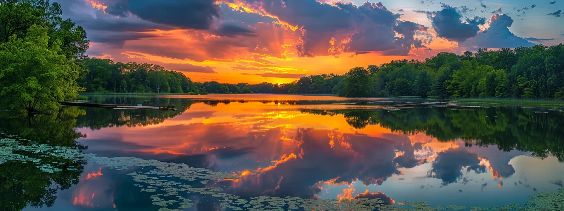a vibrant sunset casts a warm glow over a serene lake, reflecting the brilliant hues of the sky and surrounding lush greenery, inviting tranquility and contemplation.